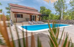 Awesome home in Puljane with Outdoor swimming pool, WiFi and 3 Bedrooms